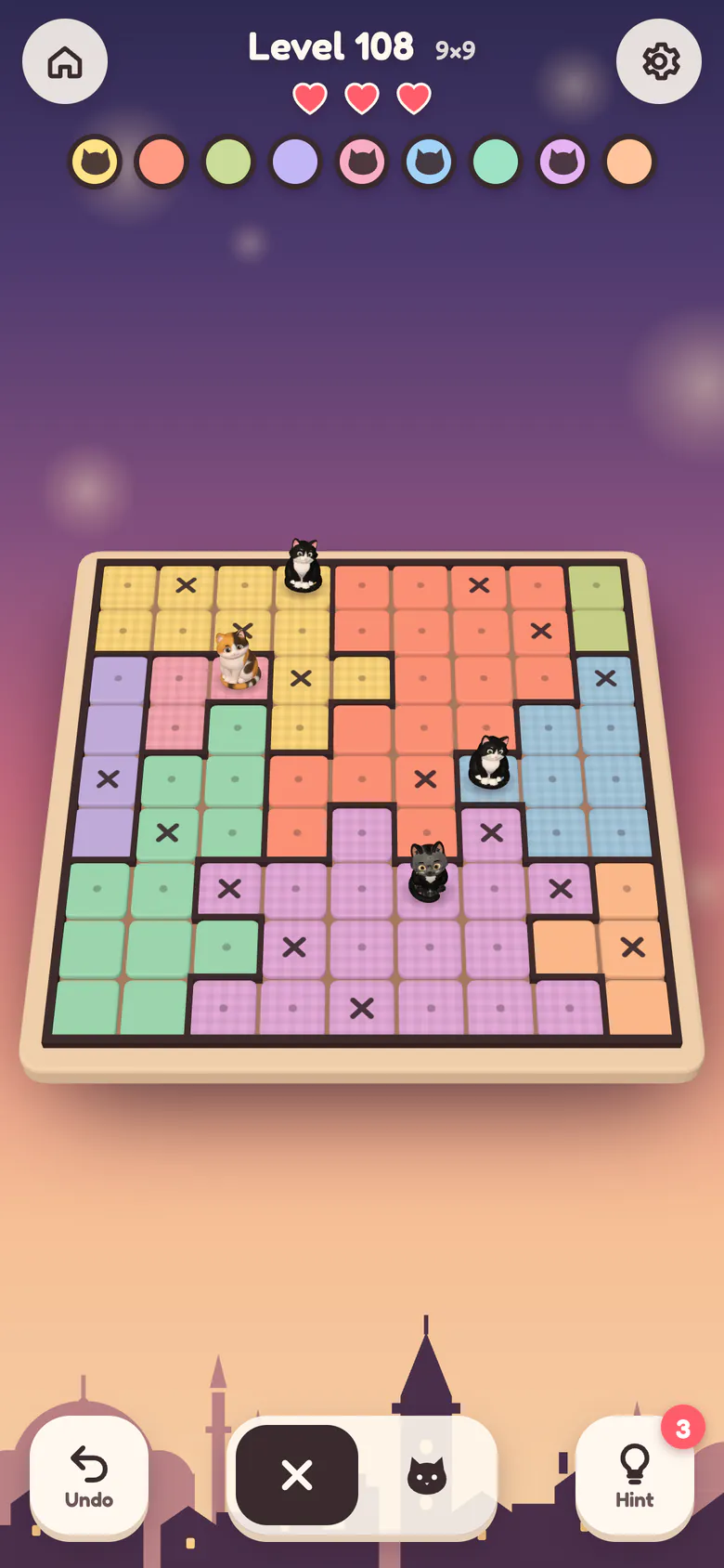 A hard 9×9 level in progress: four cats placed, many × marks, nine colourful gardens.