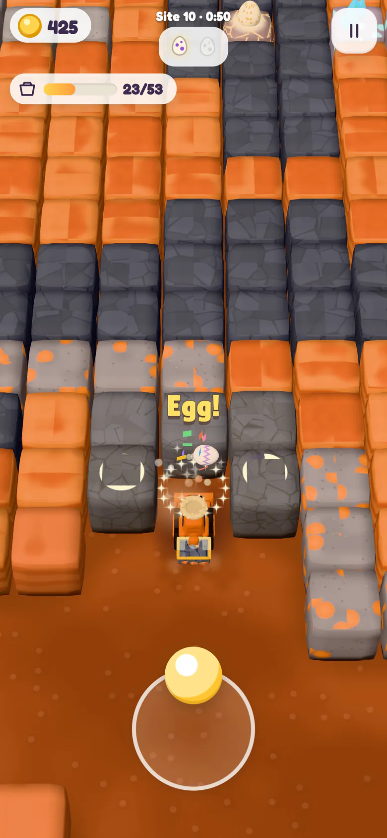 Site 10 in Red Canyon: the digger has just cracked open an egg rock and a zigzag-patterned egg pops out in a ring of sparkles and confetti under a gold Egg! popup, with the first of the two egg icons at the top lit up and a second egg rock waiting at the top of the screen.