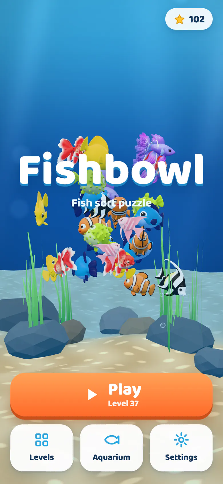 Fishbowl title screen: colourful 3D fish swimming over sand, rocks and seaweed behind the logo.