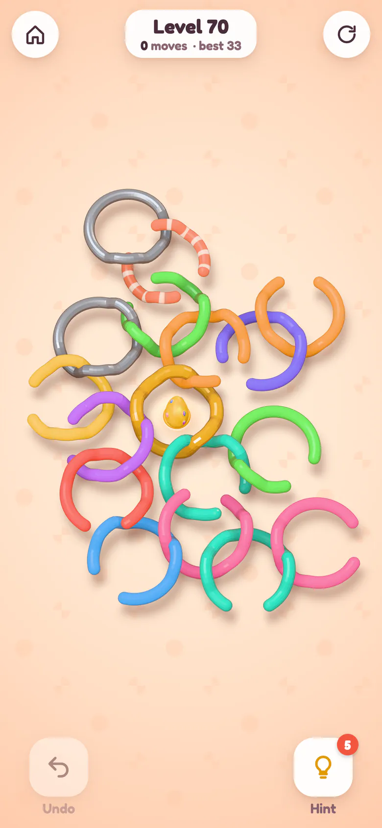 Level 70: seventeen interlinked rings, with steel pegs and a striped double-gap ring around the egg.