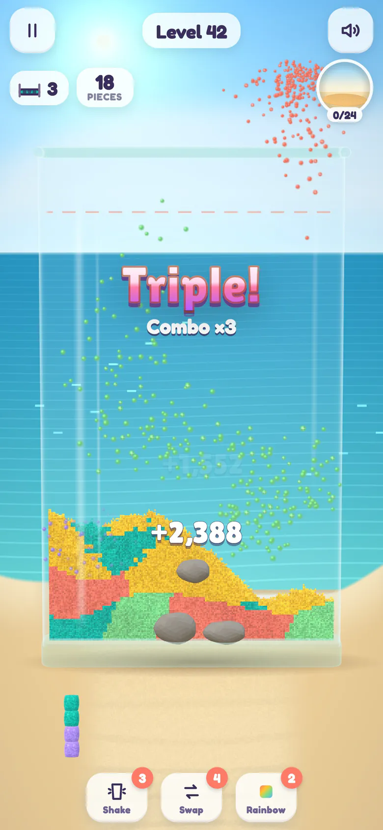 Level 42: Triple! Combo ×3 as three colour bridges clear one after another, +2,388 points, and the cleared grains stream up to the sandcastle badge.