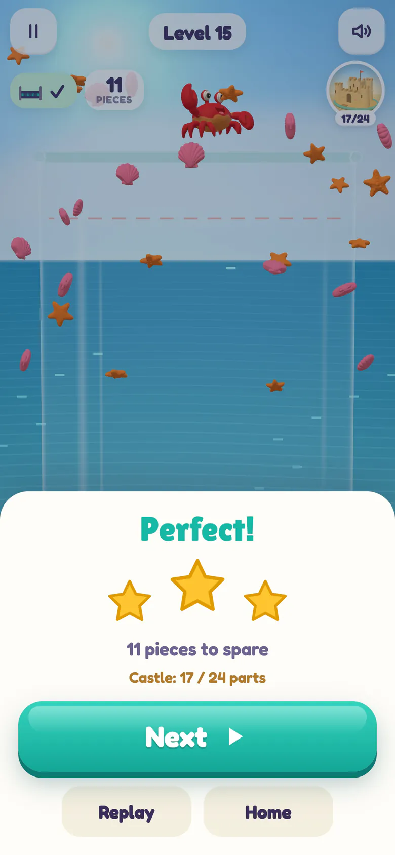 Win sheet saying Perfect! with three gold stars, 11 pieces to spare and Castle: 17 / 24 parts, while a red crab dances on top of the jar and shells and starfish fall.