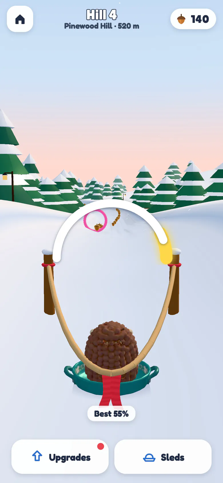 Hill 4 on Pinewood Hill at dawn: the hedgehog sits on a teal tea tray pulled back in a rope slingshot between two snowy posts, a white power arc over it filled up to its glowing gold Perfect zone, with a ring and a line of acorns waiting on the slope ahead.