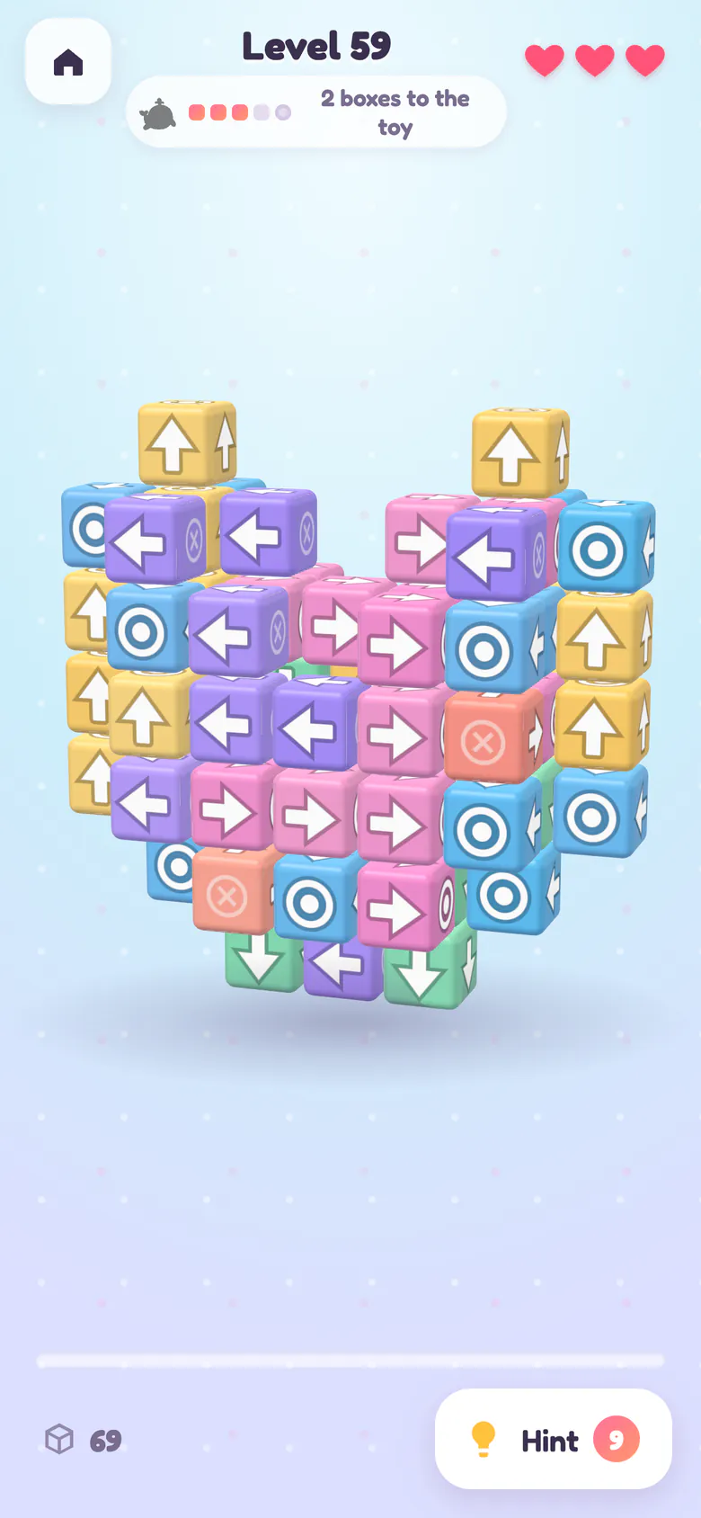 Level 59: a large heart-shaped sculpture built from dozens of colourful arrow blocks.